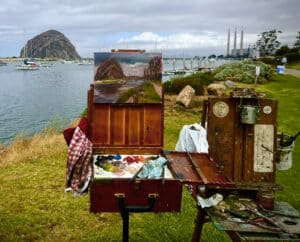 Plein air painting setup at Tidelands Park in Morro Bay overlooking Morro Rock and harbor.