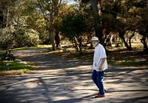 “Reference photograph of Thom walking through morning light near Shipley Nature Center used as inspiration for the plein air painting Thom Walk to Shipley.”