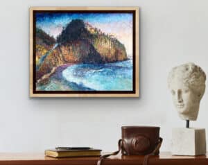 Crystal Cove Re-Imagined displayed framed on a contemporary wall, showing the vibrant mixed media landscape in a home setting.