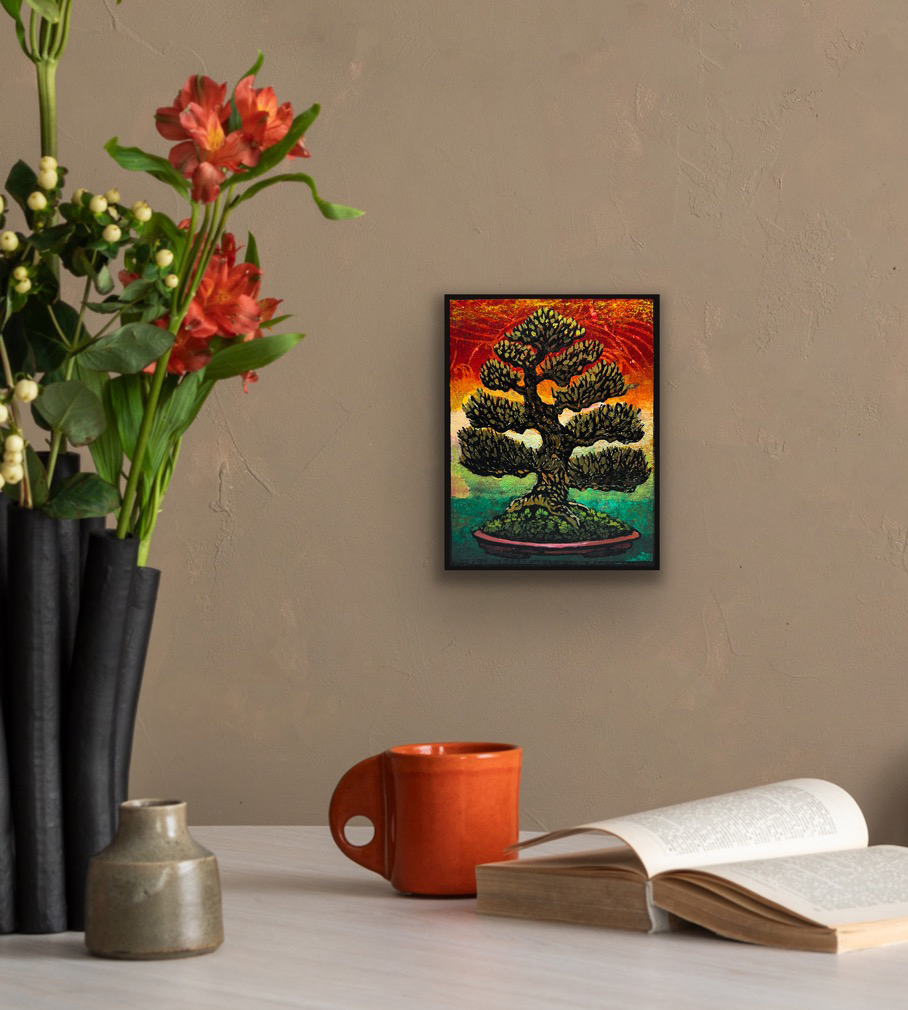 Euro Beech Monoprint #2 displayed in a black frame on a neutral interior wall above a tabletop with flowers, ceramic pottery, and an open book.