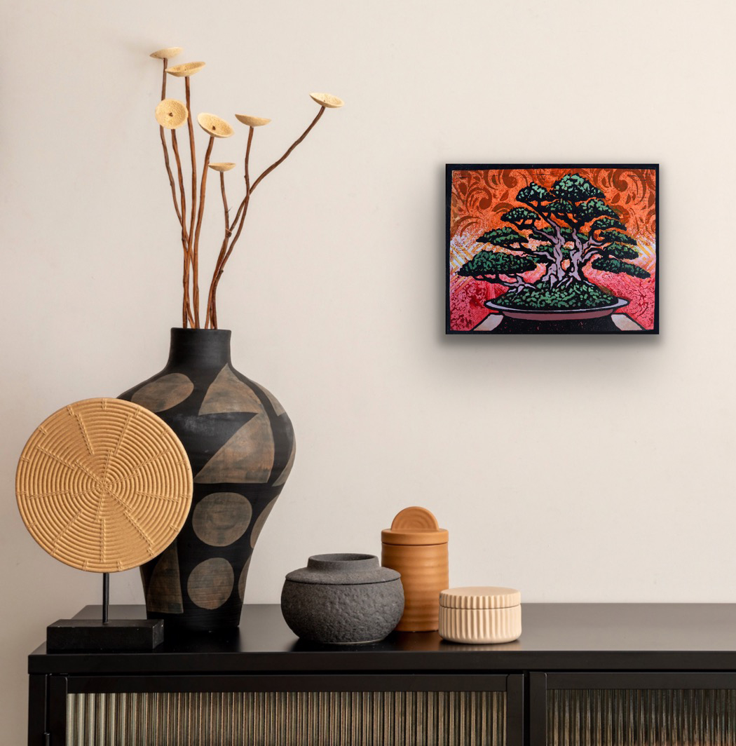 Ota Azalea Monoprint #2 displayed on a neutral gallery wall above a dark cabinet with Japanese-inspired ceramic vessels and decorative objects, showing the artwork in a contemporary interior.