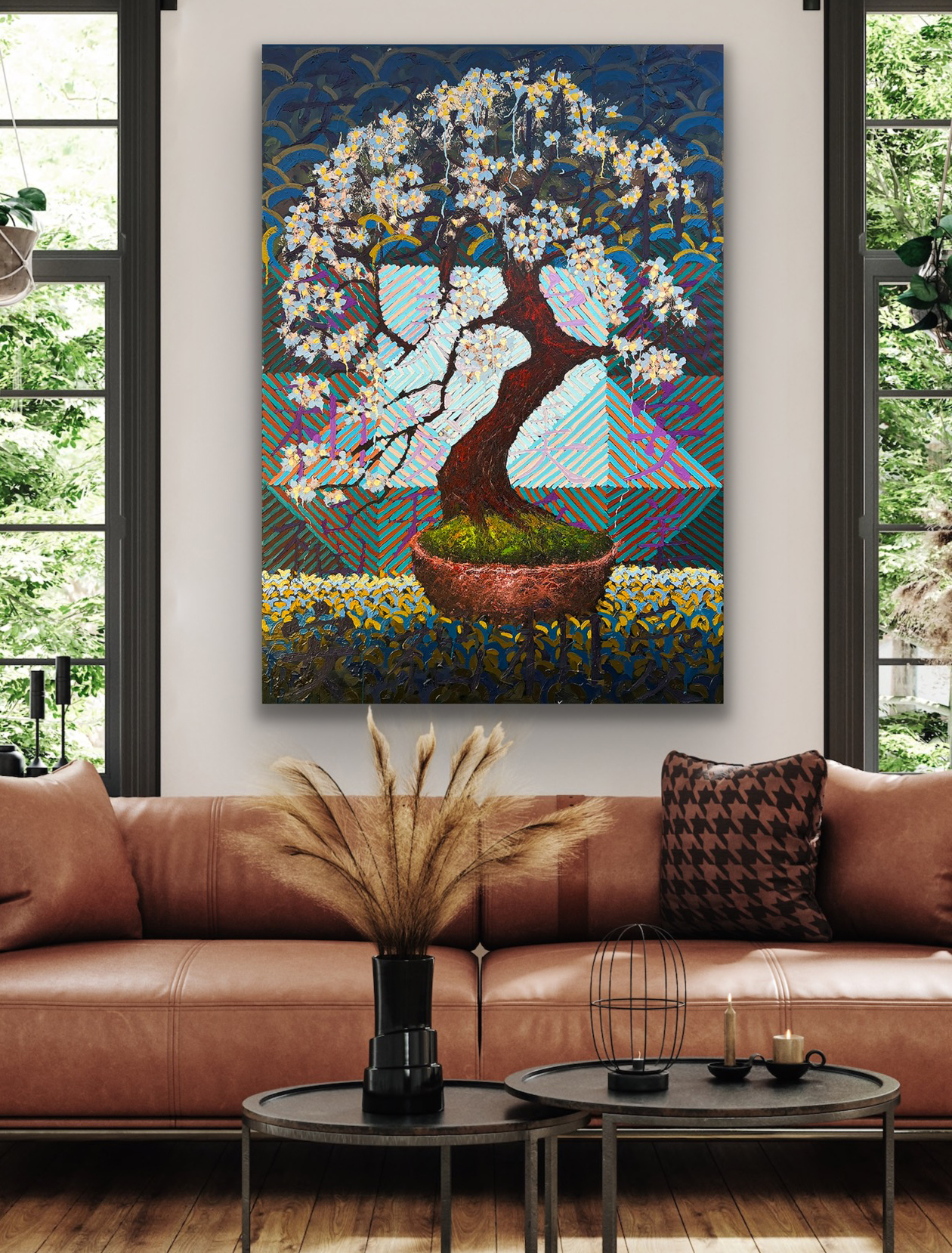 Large Wild Plum bonsai oil painting by Ron Reekers displayed above a brown leather sofa in a contemporary living room, illustrating the scale and visual presence of the 60 × 42 inch artwork.